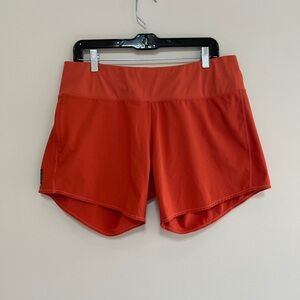 Oiselle Long Toolbelt Roga Shorts in Dark Orange, size 10